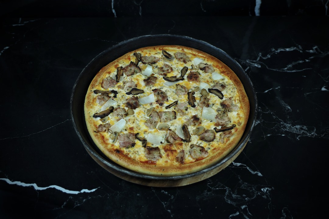 Malai boti pizza